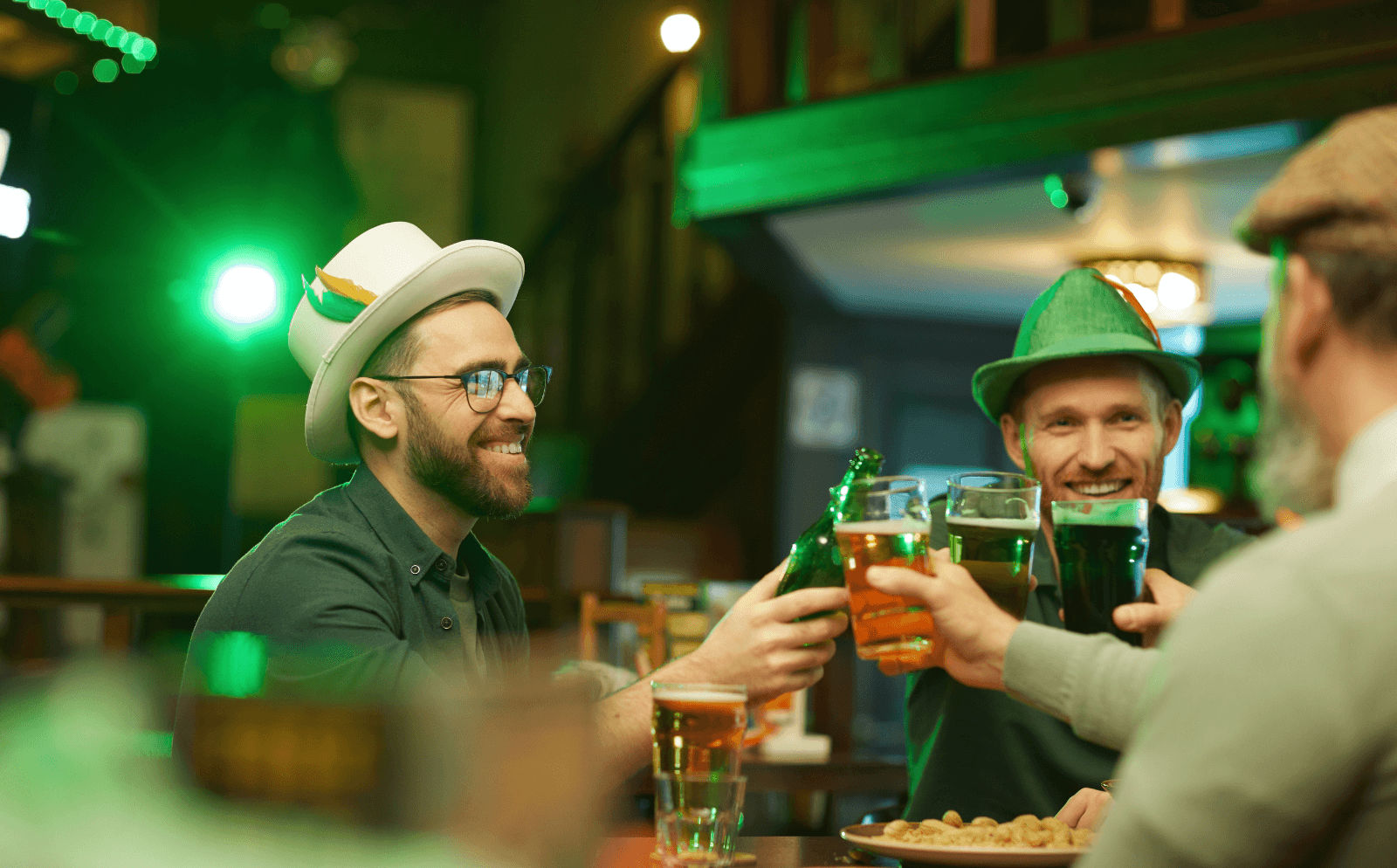 men toasting their beers