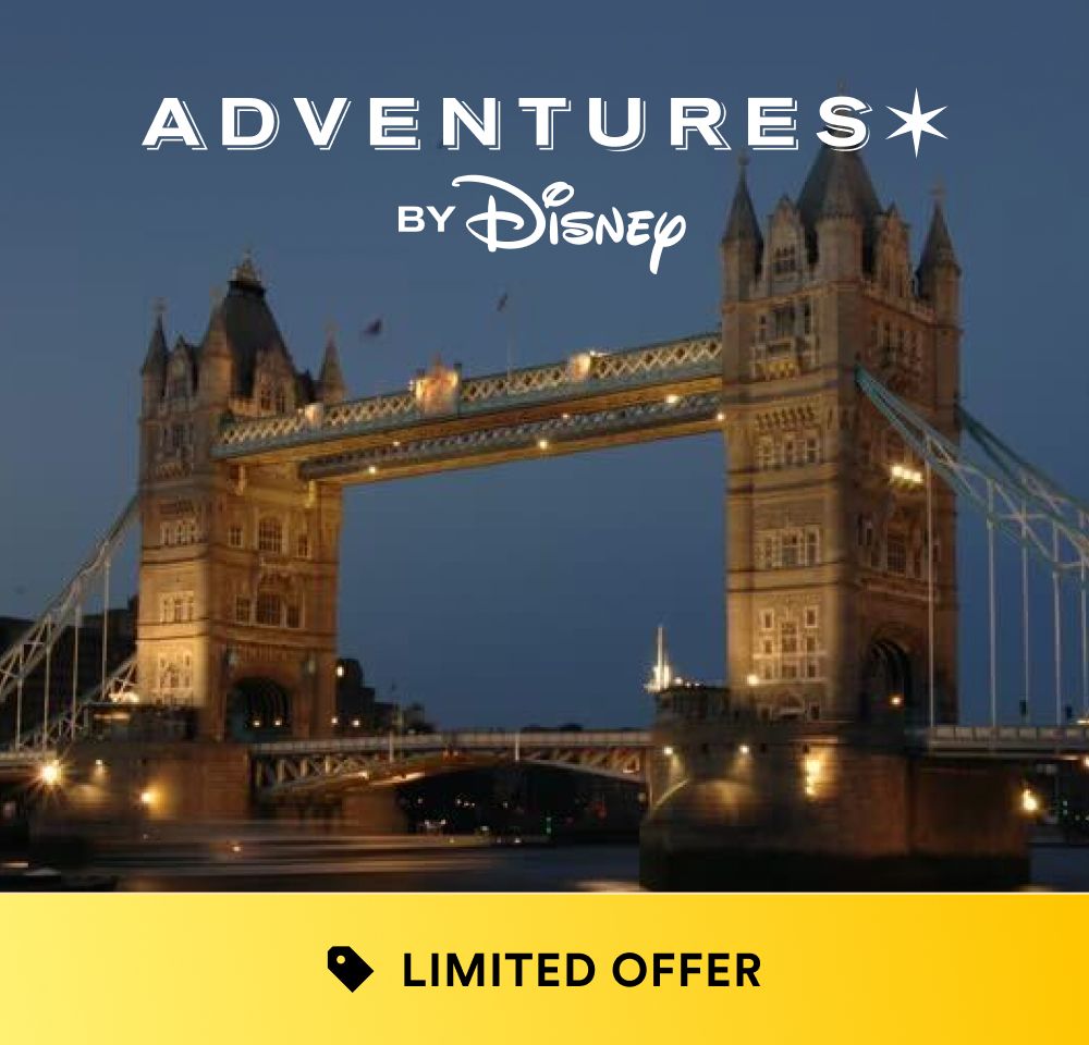 Night view of Tower Bridge in London with Adventures by Disney logo and limited offer banner