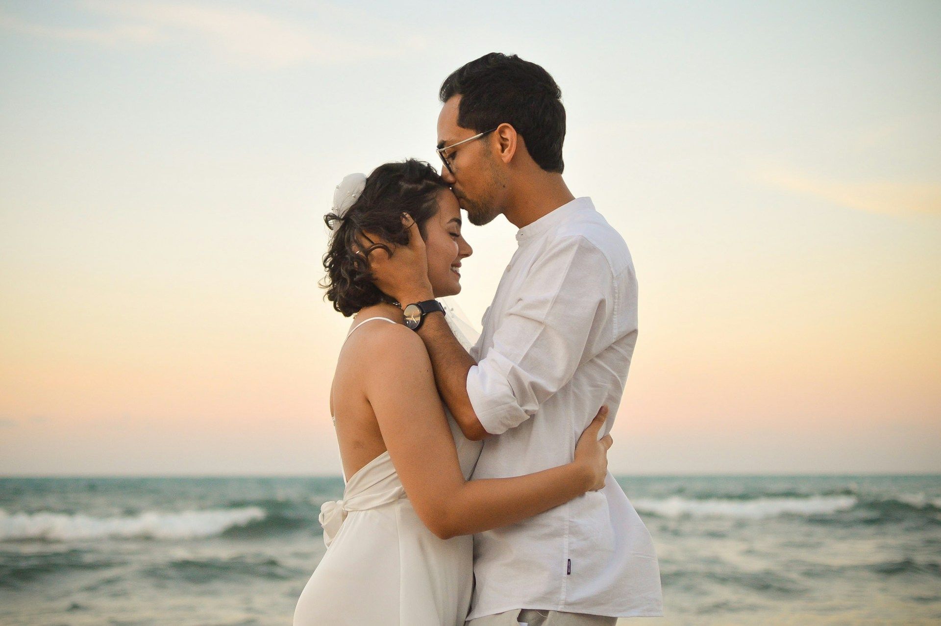 Couple on a honeymoon overlooking the beach