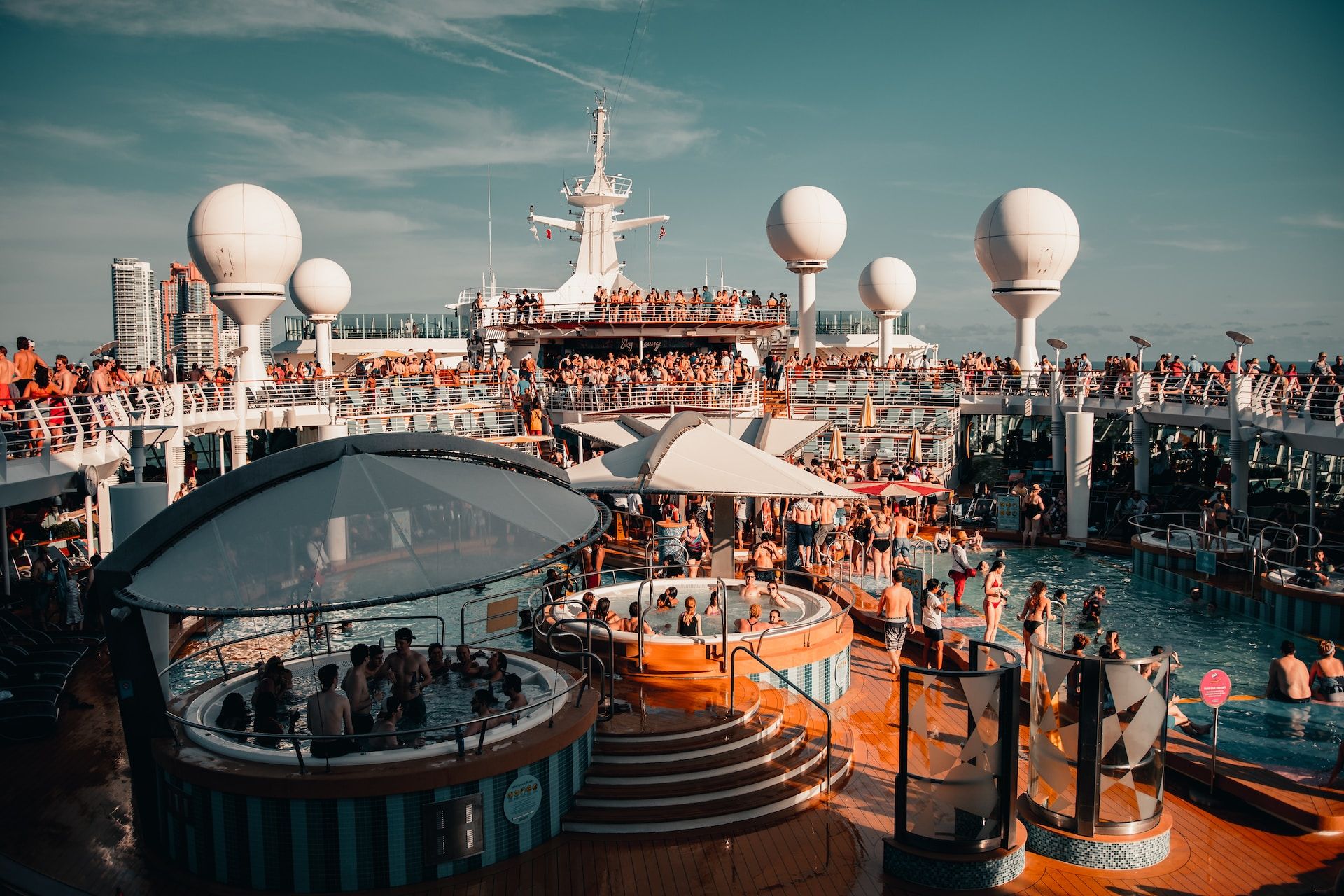 crowded pool deck on a cruise ship