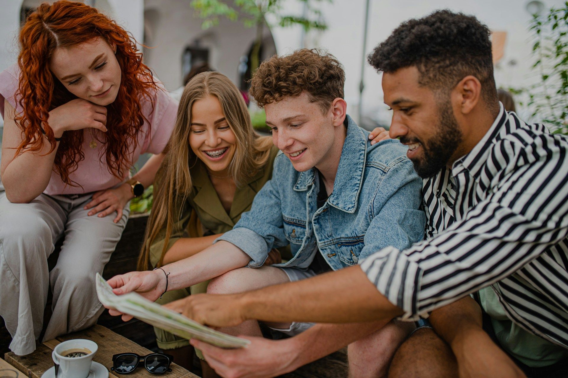 A group of friends looking at a map